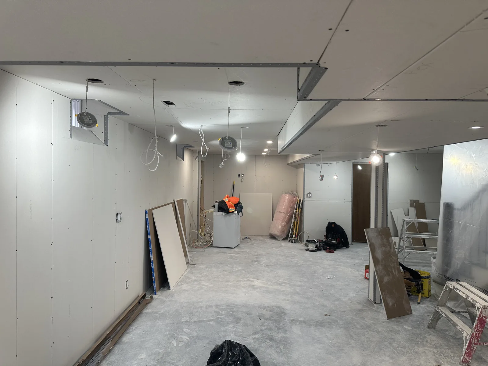 Basement with framing, drywall, electrical and plumbing complete