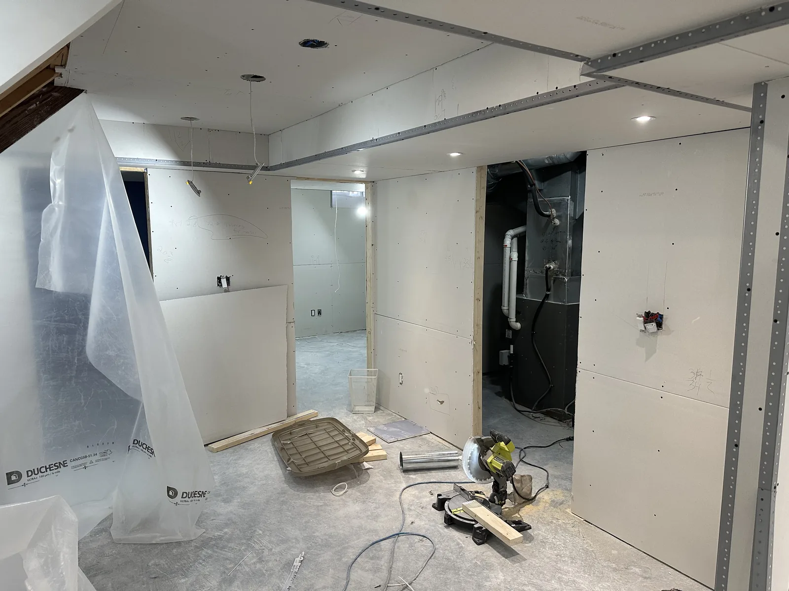 Basement rooms taking shape behind new drywall