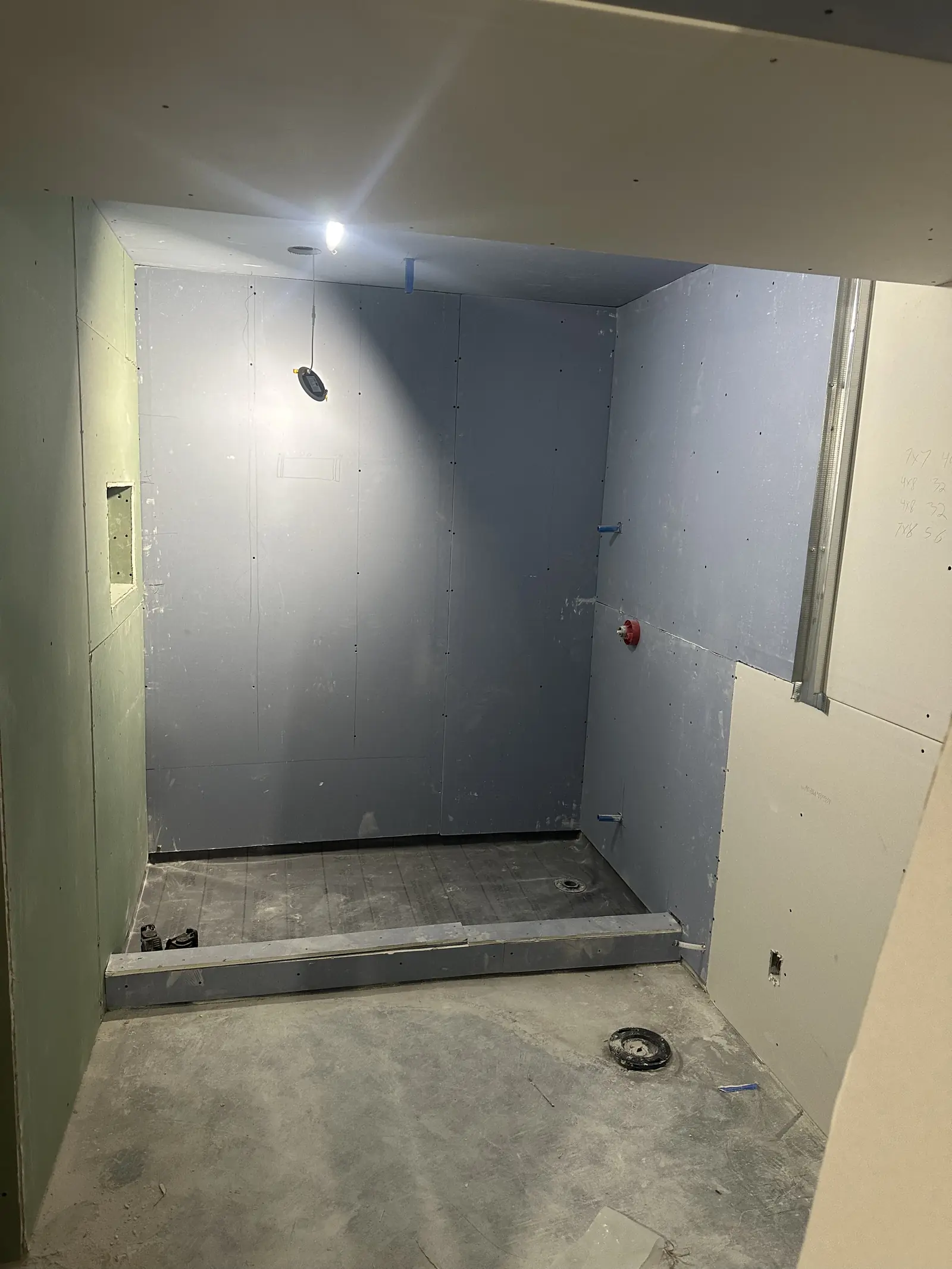 Painted basement walls before the flooring goes down