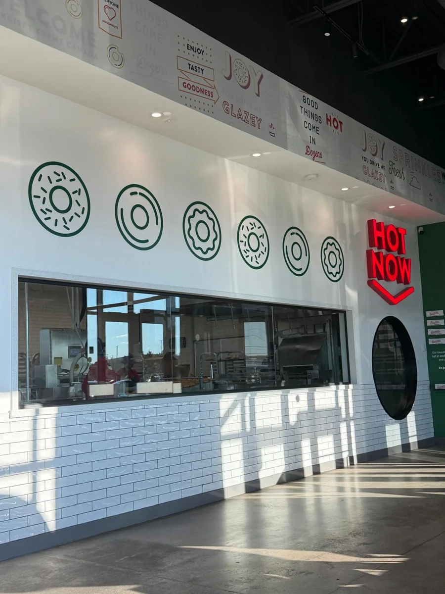 Completed Krispy Kreme storefront with Hot Now signage