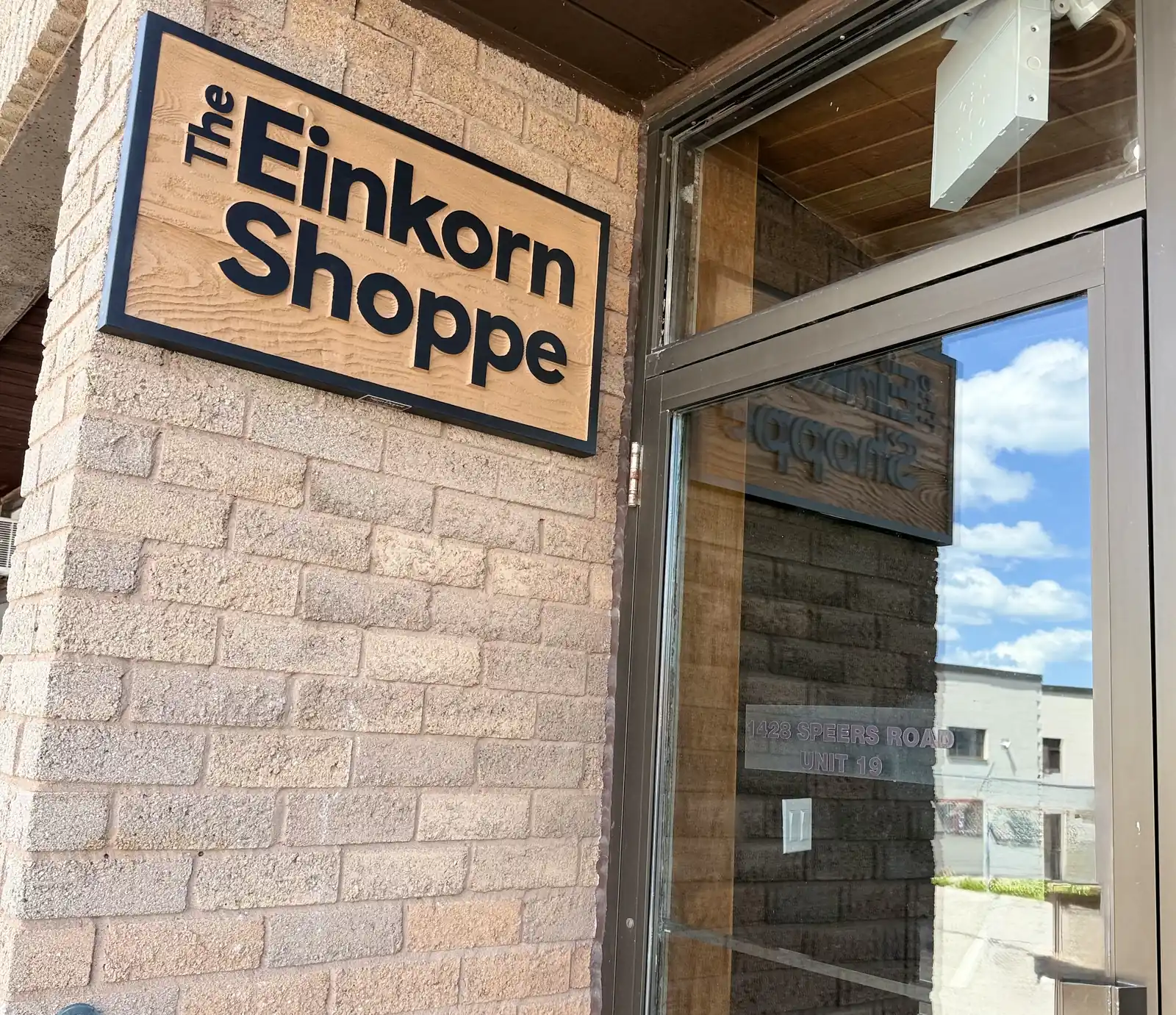 Completed storefront corner with signage