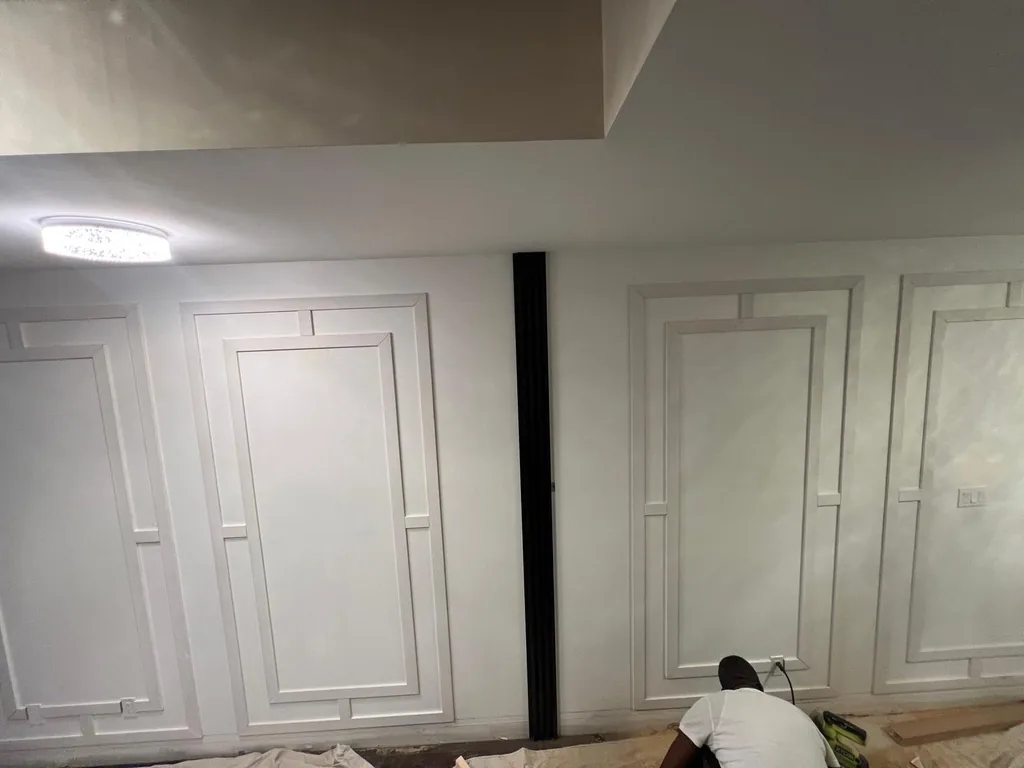 A finished interior with coffered panelling