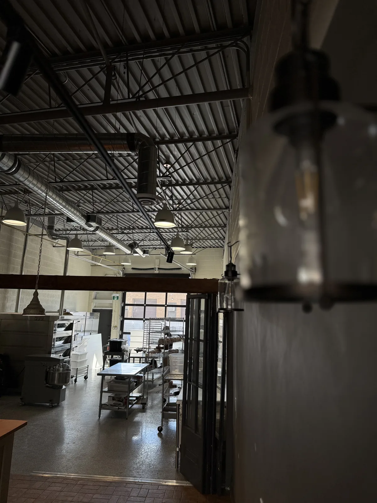 Finished interior with pendant lighting