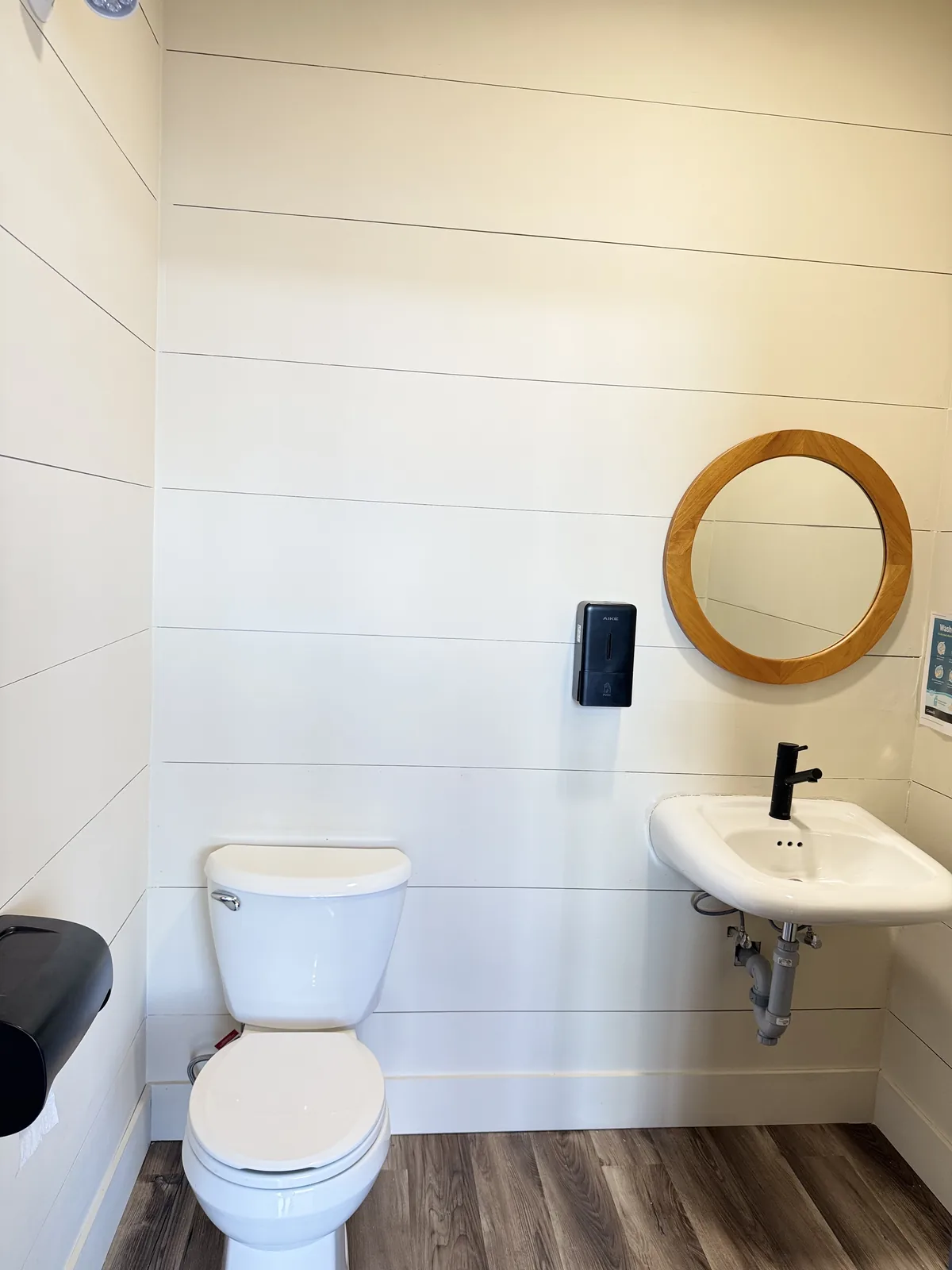 Finished washroom with shiplap walls